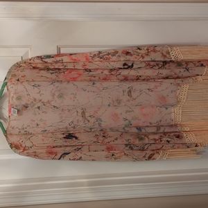 Floral open front semi sheer blush colored cardigan cover up.